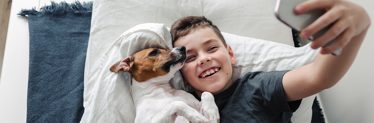 boy-taking-selfie-with-dog-1242x411_new.png