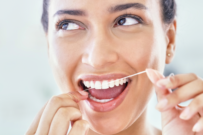 woman-flossing-800x533.png
