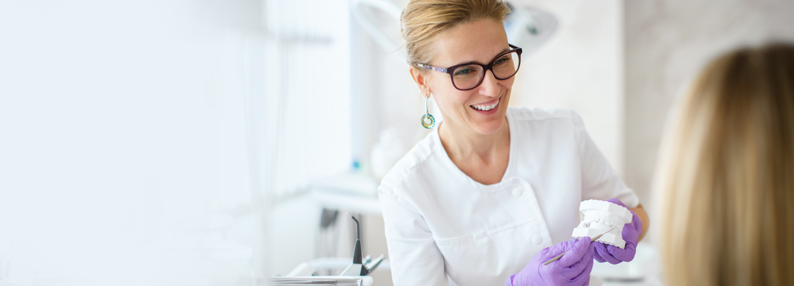 dentist-talking-with-patient-1600x578-ALT.jpg