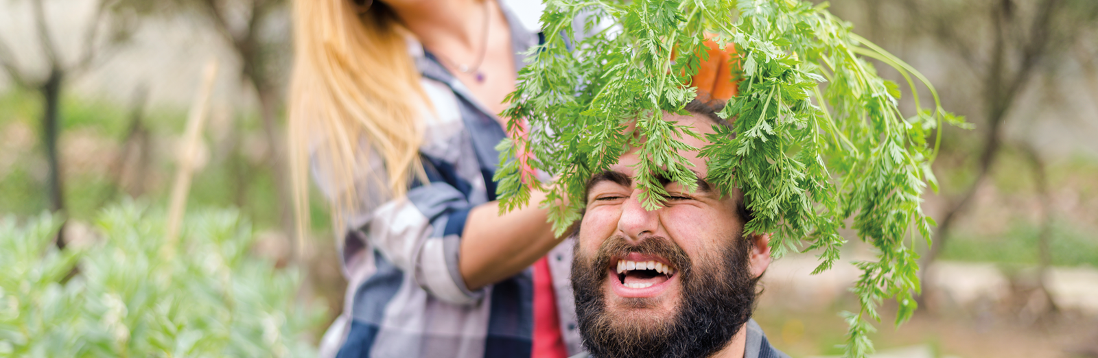 man-with-plant-on-head-1600x522.png