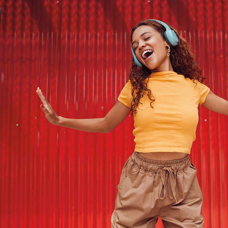 woman-dancing-wearing-headphones-800x800.png