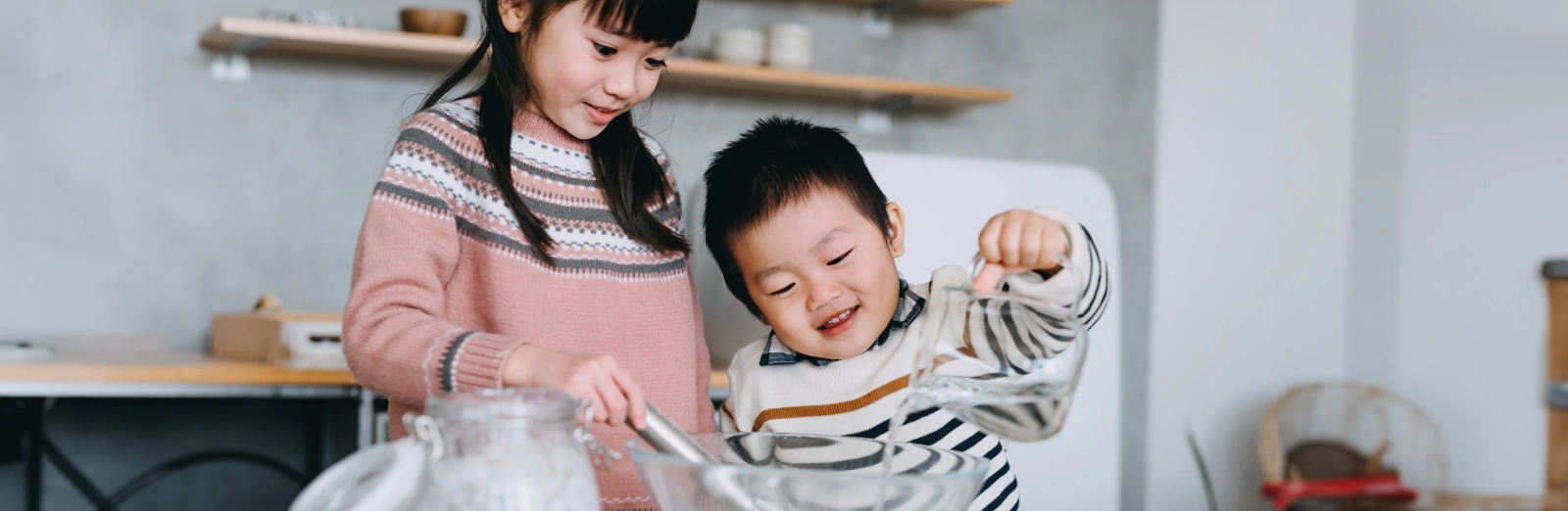 two-kids-baking-1600x522.webp