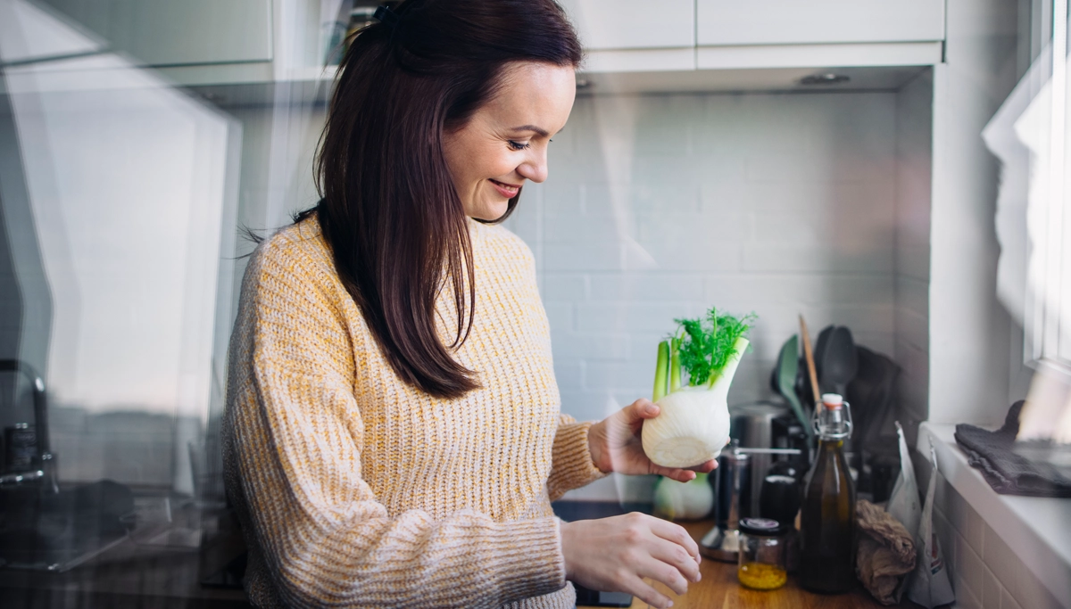 woman-smiling-holding-fennel-1200x683.webp