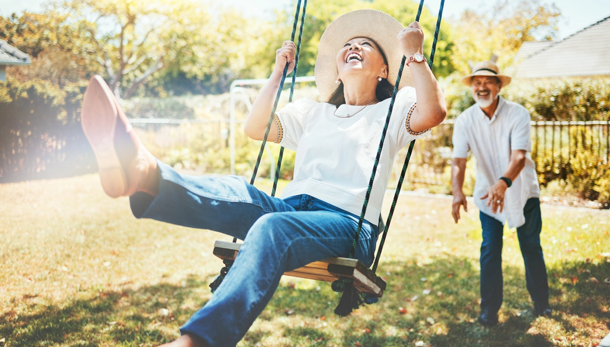 man-pushing-woman-on-swing-1200x683.webp