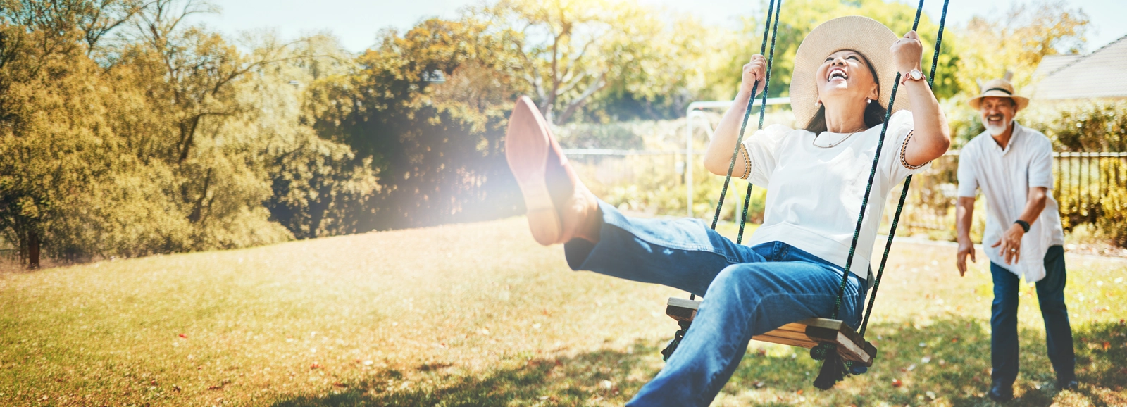 man-pushing-woman-on-swing-1600x578.webp