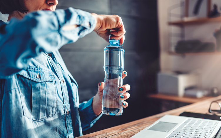 Woman-filling-water-bottle-752x468.jpg